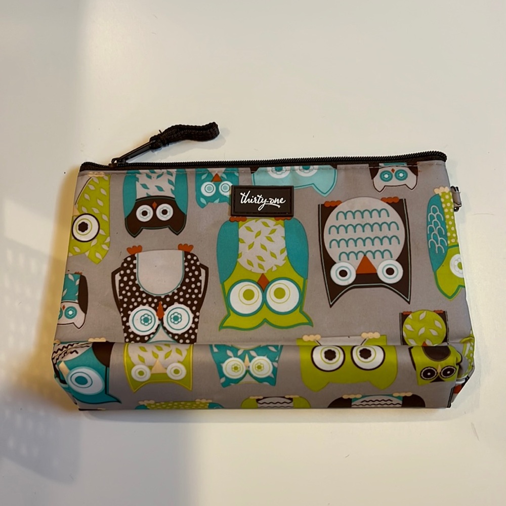 Thirty-one insulated owl pouch.